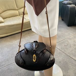 Vintage armadillo purse. Rare and unique with leather cord straps. Clean inside.